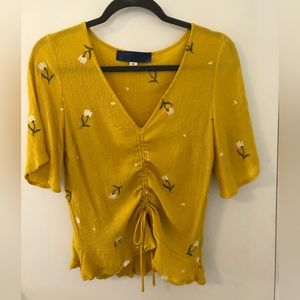 BLUE RAIN blouse. Adjustable ruching in front. Mustard color. Sz M